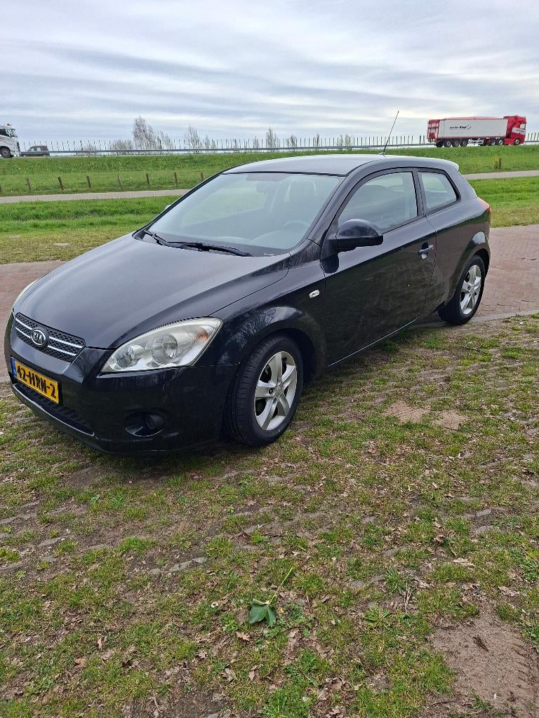 Kia (Pro) Cee d 1.4 Cvvt 2009 Zwart, Auto's, Voorwielaandrijving, Stof, Zwart, 4 cilinders