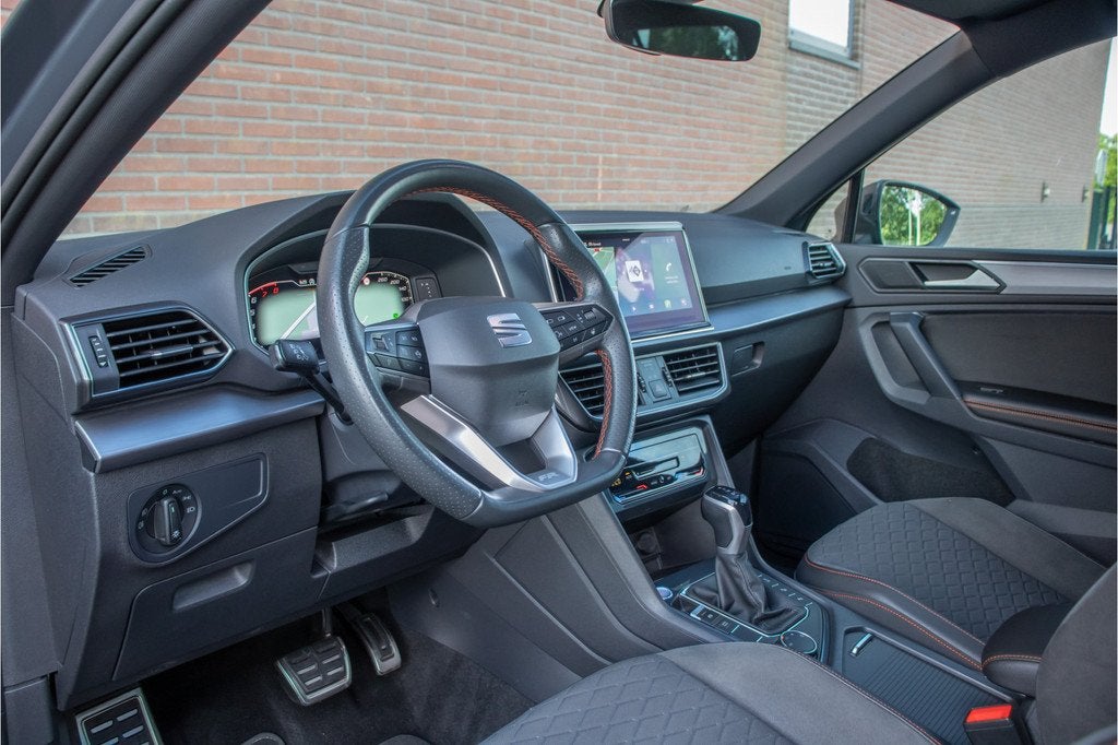 SEAT Tarraco 1.5 TSI DSG FR *VERKOCHT* (bj 2023, automaat), Stof, 4 cilinders, 150 pk, 7 stoelen