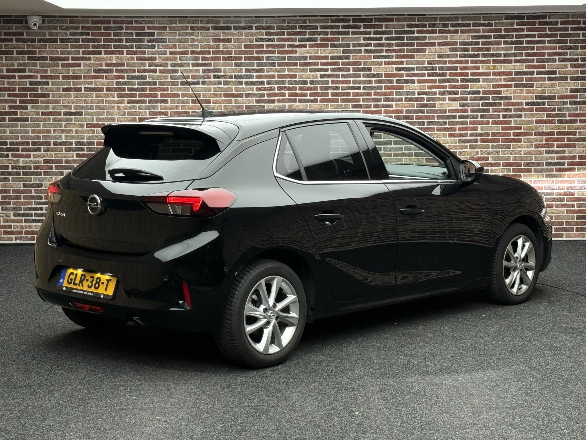 Opel Corsa 1.2 Elegance, Auto's, Stof, Gebruikt, Euro 6, Zwart