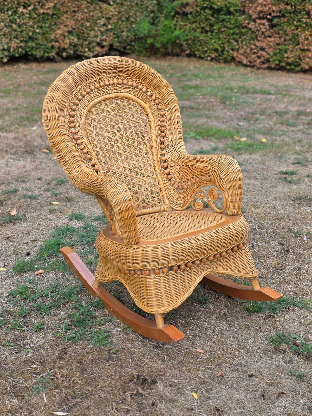 Vintage rotan pauw - schommelstoel, Ophalen, Zo goed als nieuw, Stoel(en)