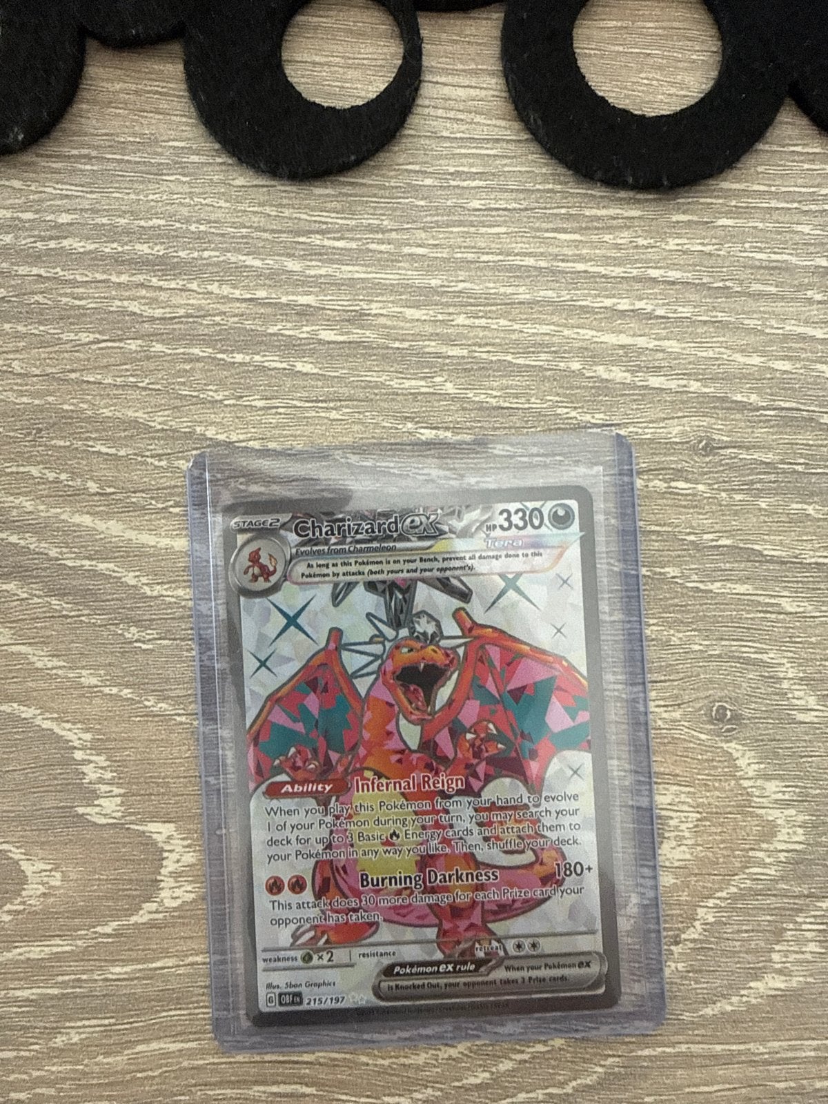 Charizard EX 215/197 Obsidian Flames Pokémon Kaart, Ophalen of Verzenden, Zo goed als nieuw, Losse kaart