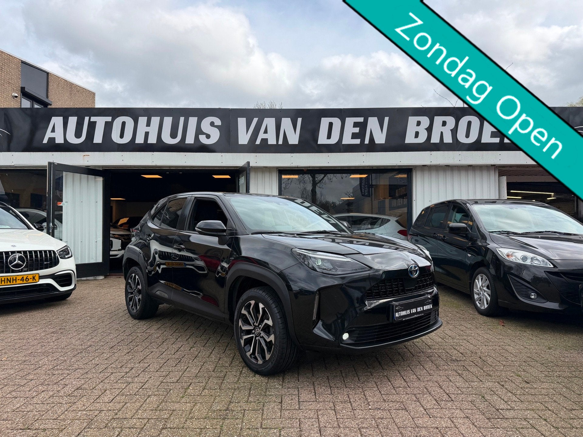 Toyota Yaris Cross 1.5 Hybrid First Edition|Navi|Cruise|Clim, Auto's, Dealer onderhouden, Gebruikt, Zwart, Bedrijf