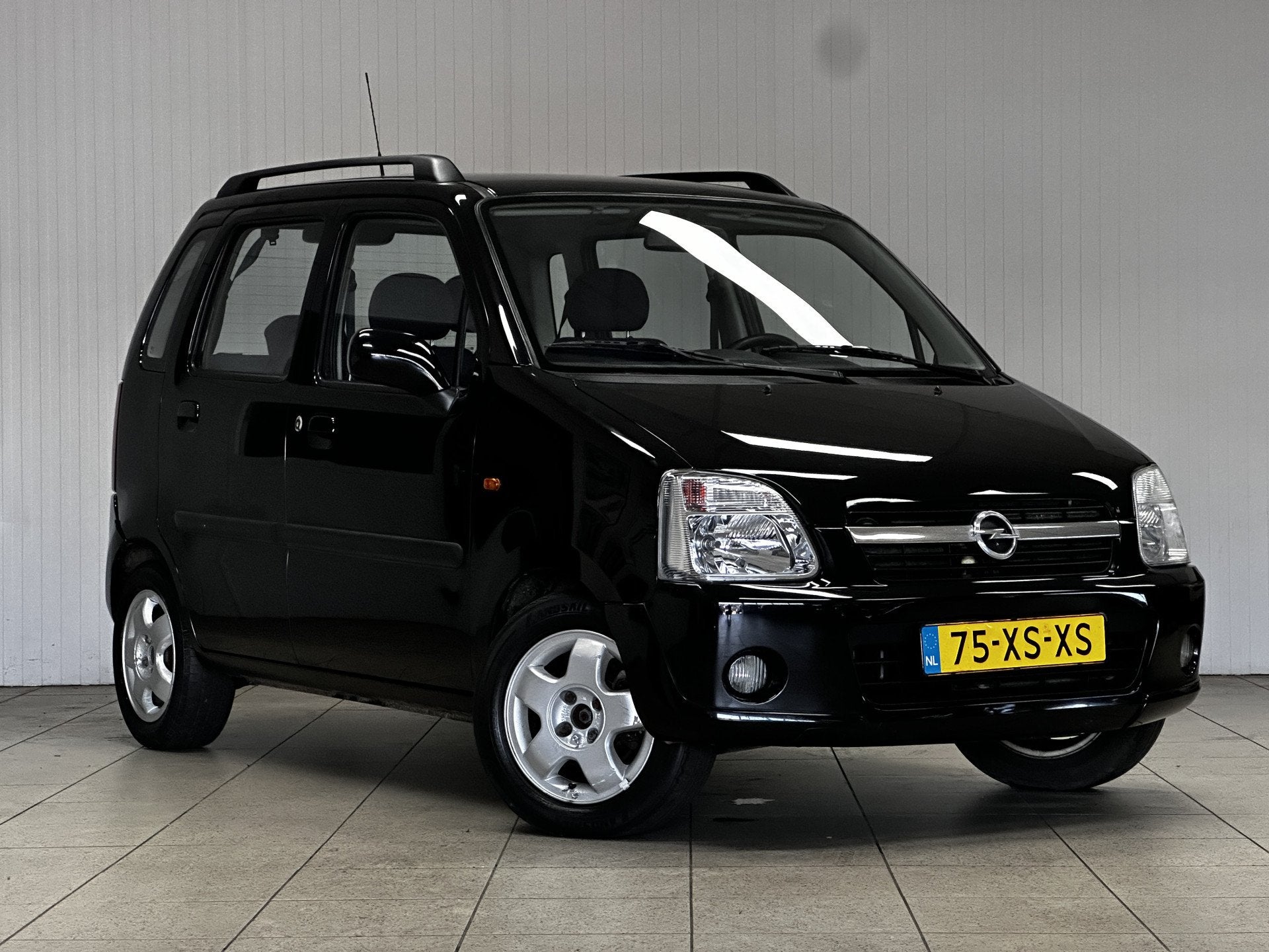Opel Agila 1.2-16V Temptation/ 5-Drs/ Trekhaak/ Airco/ C.V., Auto's, Stof, Zwart, 4 cilinders, 82 pk