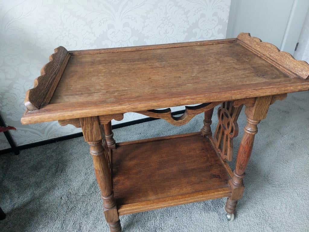 Houten theetafel met wieltjes, Ophalen