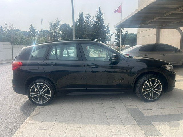 Foto 8 van BMW X1 Sdrive18d High Executive Aut 2017 Zwart