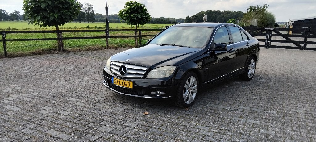 Mercedes-Benz C-Klasse 1.8 C180 CGI Sedan AUT 2010 Zwart, Auto's, Automaat, 745 kg, Achterwielaandrijving, 1800 kg