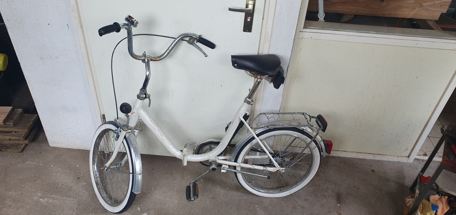 Vouwfiets., Ophalen