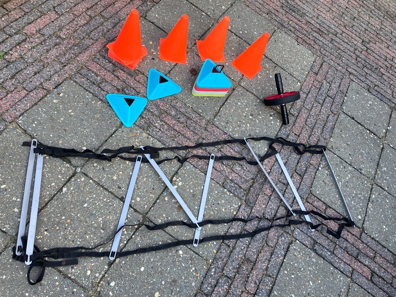 Agility set: ladder, pionnen en buikspierwiel, Ophalen of Verzenden, Gebruikt, Buikspierwiel