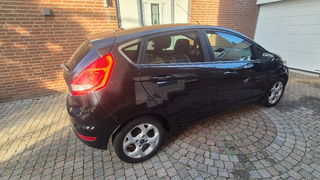 Ford Fiësta 1.25 44KW 5DR 2012 Zwart, Voorwielaandrijving, Stof, 1242 cc, 4 cilinders
