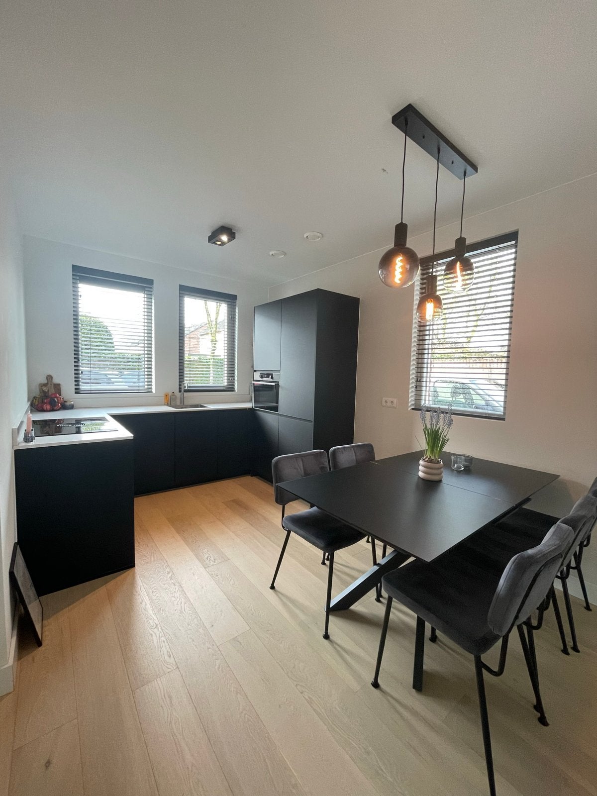 Uitschuifbare eettafel met glazen blad en spinpoot, Huis en Inrichting, Tafels | Eettafels, Ophalen, Gebruikt, 100 tot 150 cm