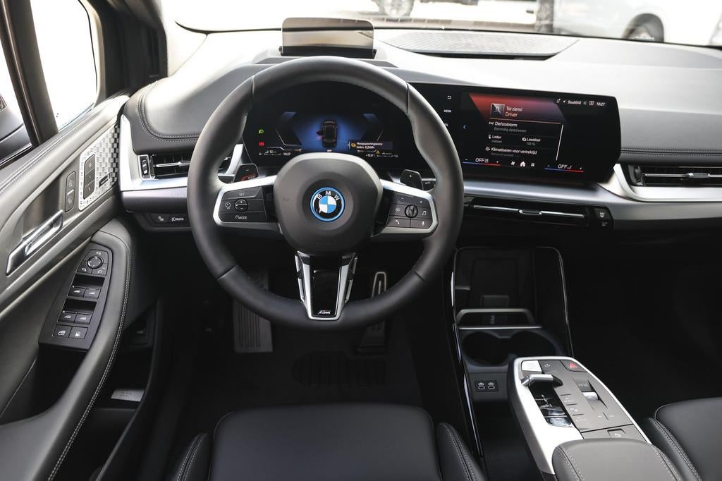 BMW 2 Serie Active Tourer 225e xDrive High Executive M Sport, Auto's, BMW, 1800 kg, Stoelverwarming, Zwart, Bedrijf