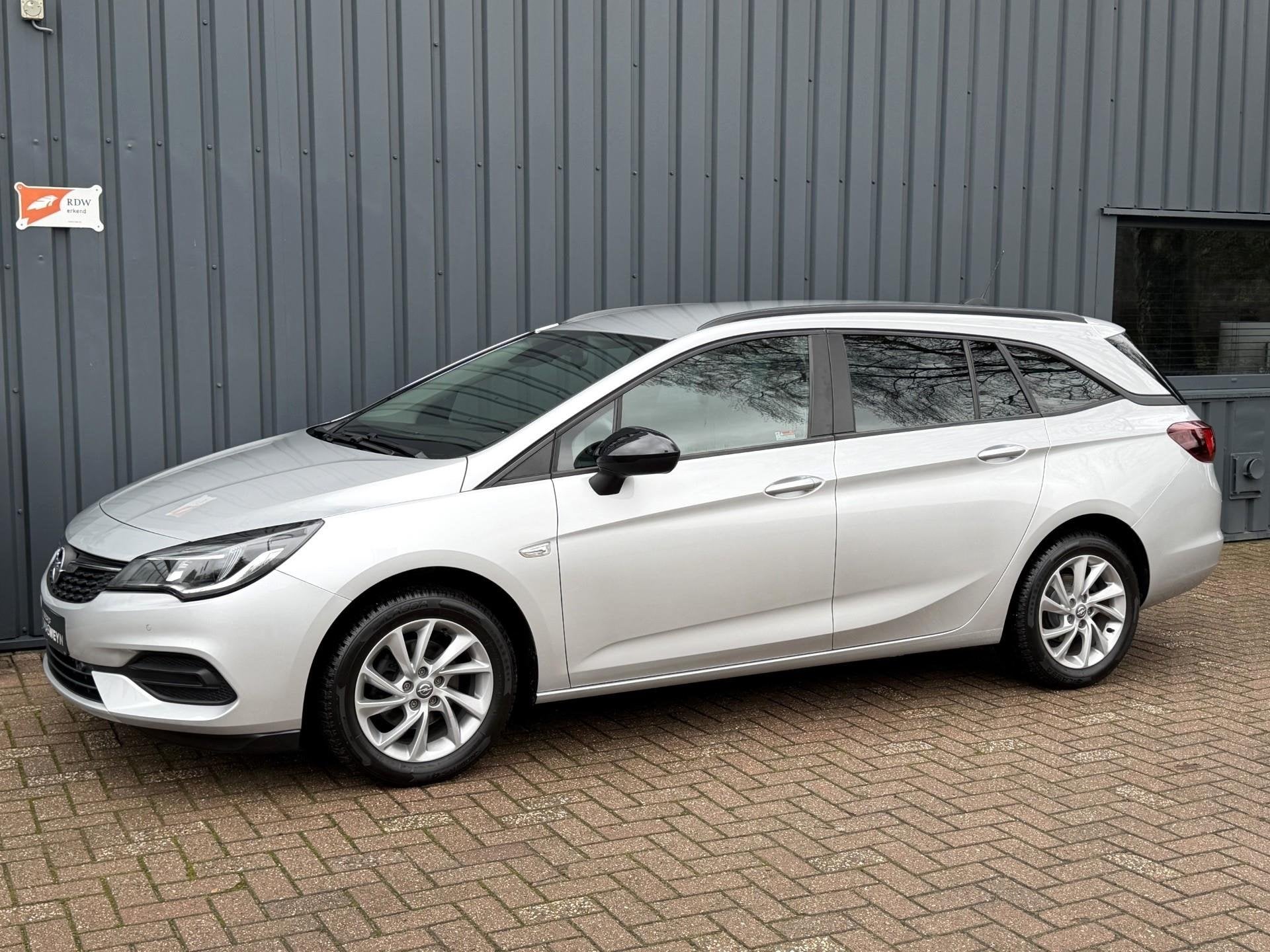 Opel Astra Sports Tourer 1.2 Ultimate 1E EIG.!/DEALER OND.!/, Voorwielaandrijving, 145 pk, Stof, Zwart