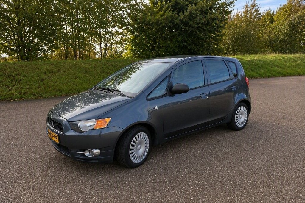 Mitsubishi Colt 1.1 5-DR 2012 Grijs, Auto's, Euro 5, Stof, 74 pk, Colt