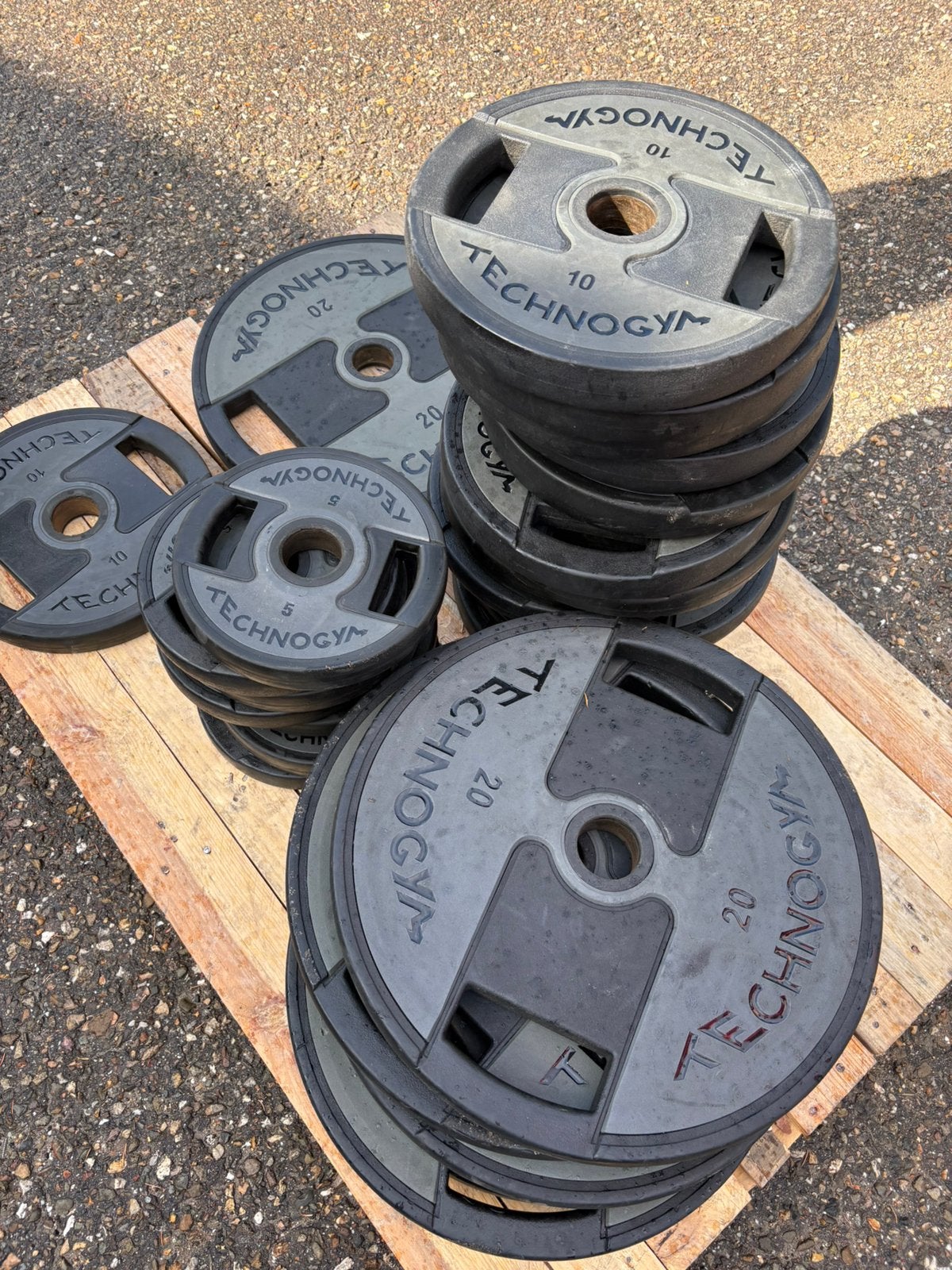 1000 kg technogym pu urethane olympische halter schijven, Sport en Fitness, Halterschijven, Pu urethane, Gebruikt, Technogym