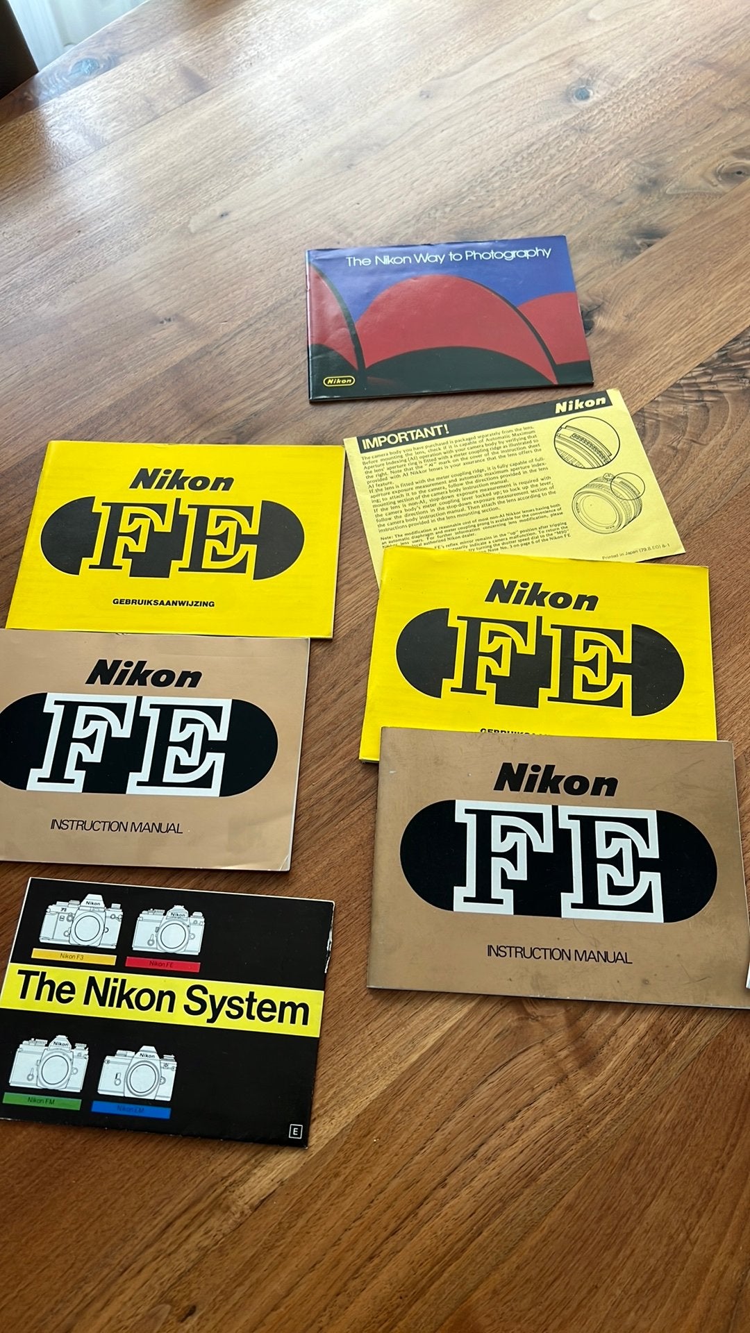 Originele boekjes nikon Fe en filter en lensdop, Ophalen, Zo goed als nieuw