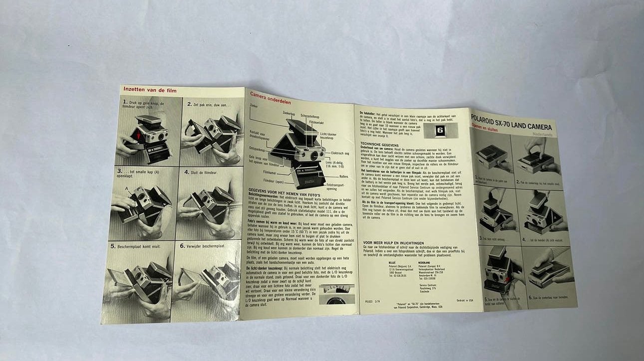 Polaroid SX -70 landcamera orig.Nederlandse beschrijving, Audio, Tv en Foto, Fotocamera's Analoog, Ophalen of Verzenden, Zo goed als nieuw