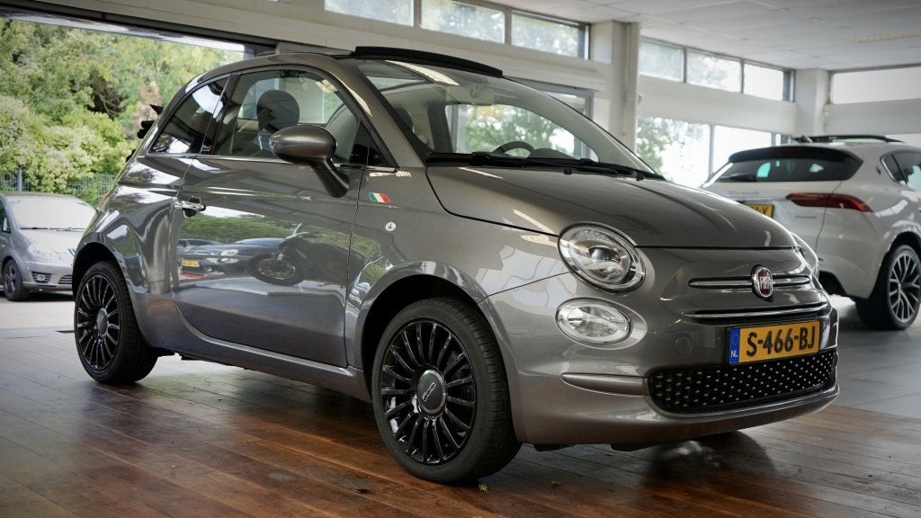 Fiat 500C 1.2 Lounge Cabrio | Leder | Clima | Cruise |, Keurmerk '100% Onderhouden', Gebruikt, 4 cilinders, 4 stoelen