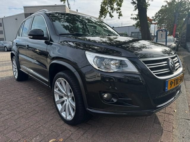 Volkswagen Tiguan 2.0 TSI 200pk Sport&Style 4Motion R-Line A, Auto's, Automaat, Euro 5, 1566 kg, Gebruikt