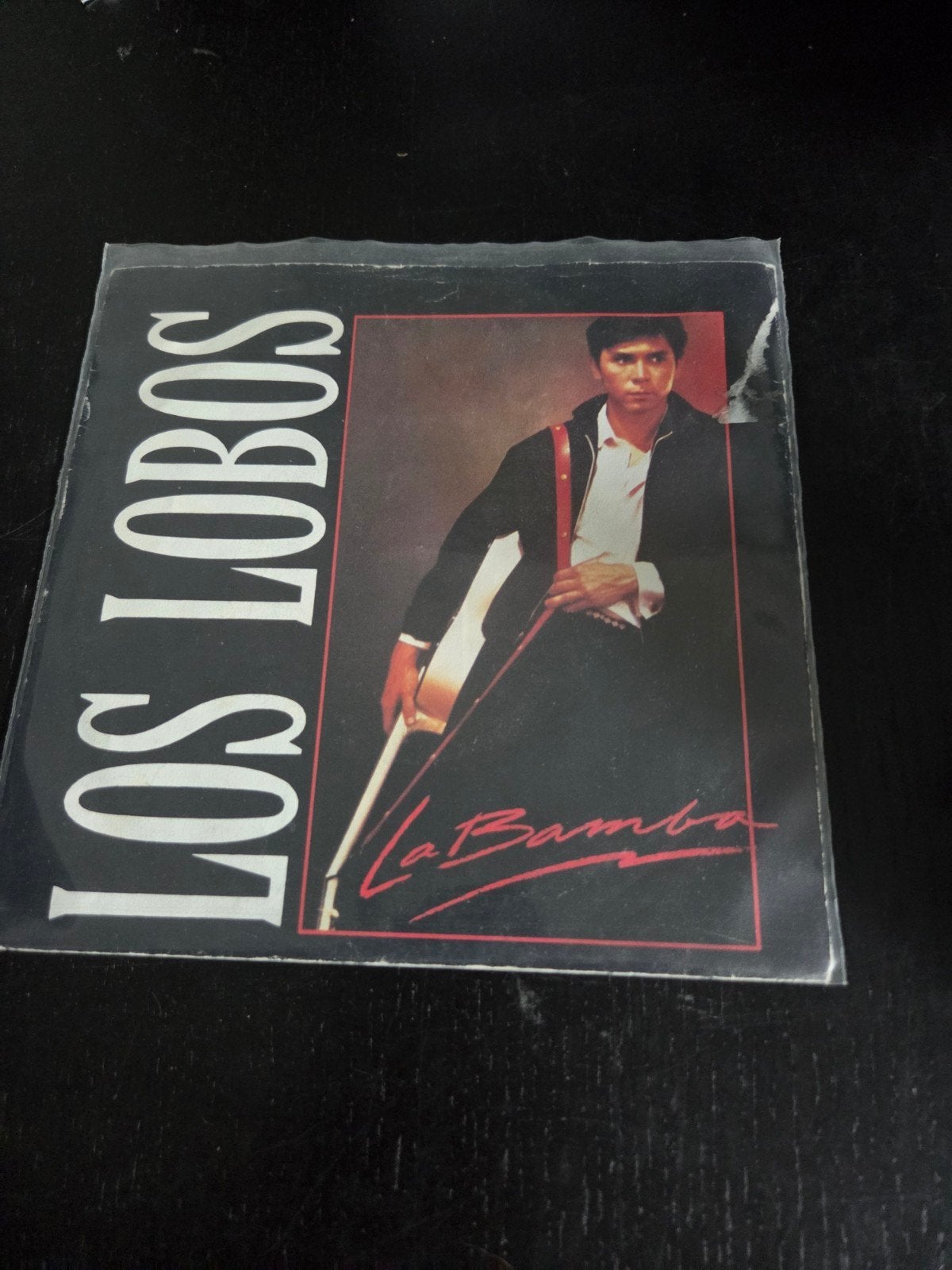 Los Lobos - La Bamba 7 inch vinyl single (z.g.a.n.), Latin en Salsa, 7 inch, Ophalen of Verzenden, Zo goed als nieuw