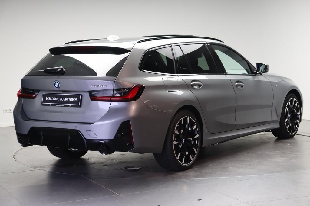 BMW 3 Serie Touring 330e M Sport Automaat / Panoramadak / Tr, Auto's, BMW, Automaat, 1998 cc, Achterwielaandrijving, Zwart