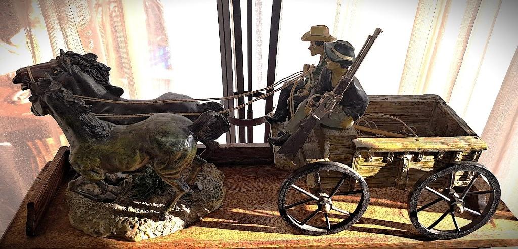 huifkar met paarden Wild West, Ophalen