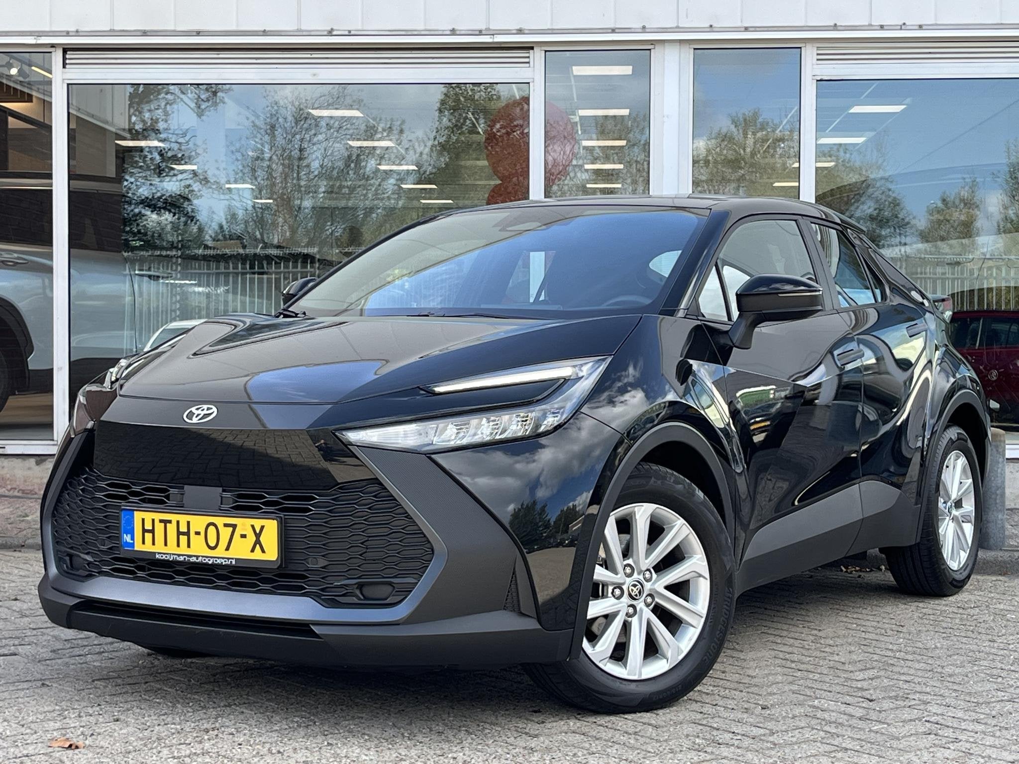 Toyota C-HR 1.8 Hybrid 140 Active, Auto's, Stof, Euro 6, 4 cilinders, Zwart