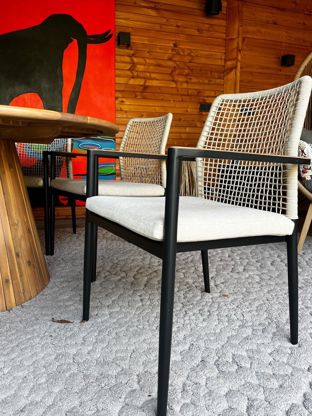 Foto 4 van Ronde eettafel met 6 stoelen - Teakhout en Wicker