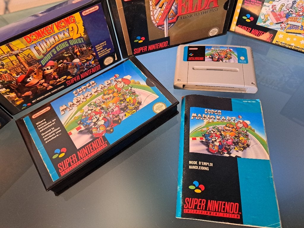 Super Nintendo SNES Super Mario Kart met boekje, Spelcomputers en Games, Games | Nintendo Super NES, 1 speler, Racen en Vliegen