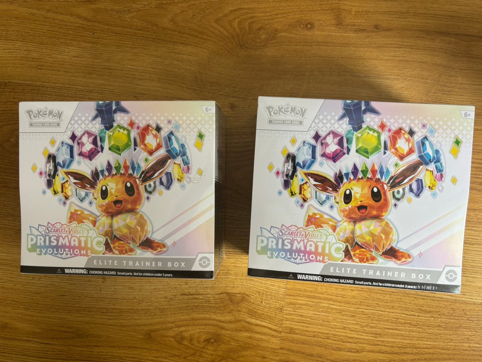 Pokémon Prismatic Evolutions - Elite Trainer Box (5+), Ophalen of Verzenden, Nieuw, Boosterbox