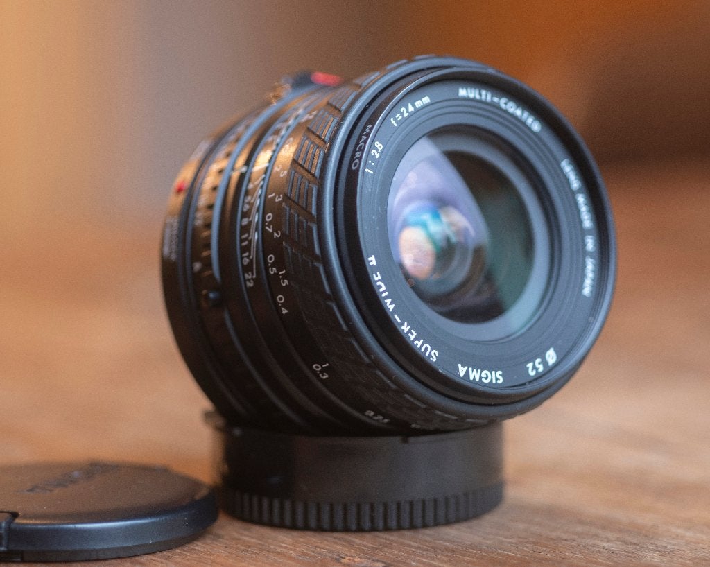 Sigma Super Wide II 24mm f/2.8 Canon FD mount, near mint, Sigma, Canon FD, Zo goed als nieuw, Macrofunctie