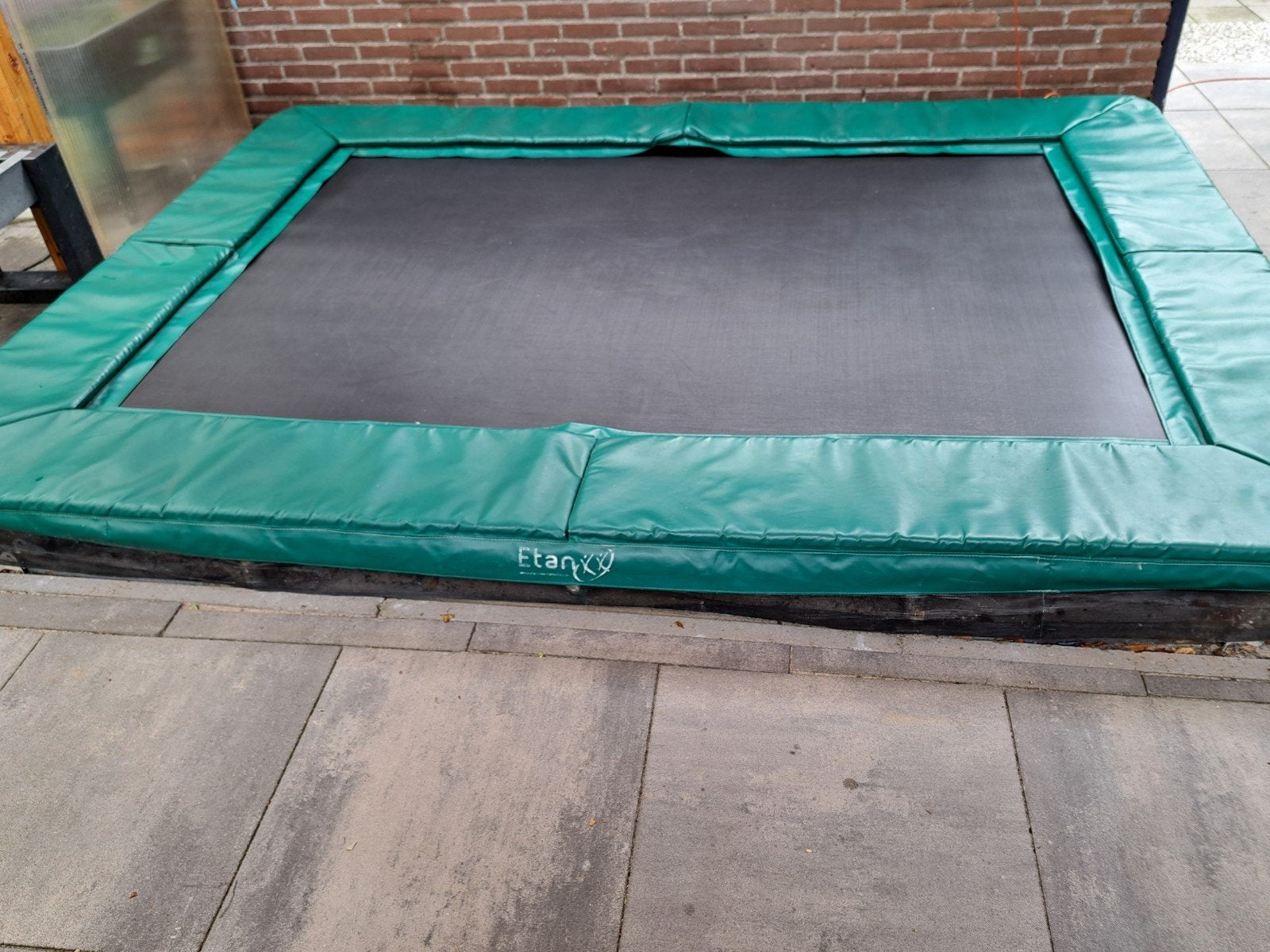 Etan inground trampoline 310 × 232, Ophalen, Gebruikt