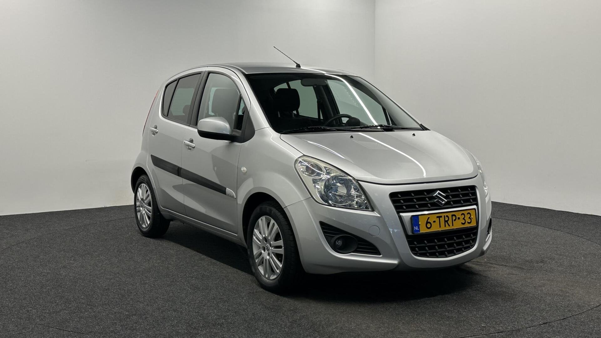 Suzuki Splash 1.2 Exclusive EASSS AIRCO TREKHAAK STOELVERWAR, Auto's, Suzuki, Voorwielaandrijving, Stof, 4 cilinders, Origineel Nederlands