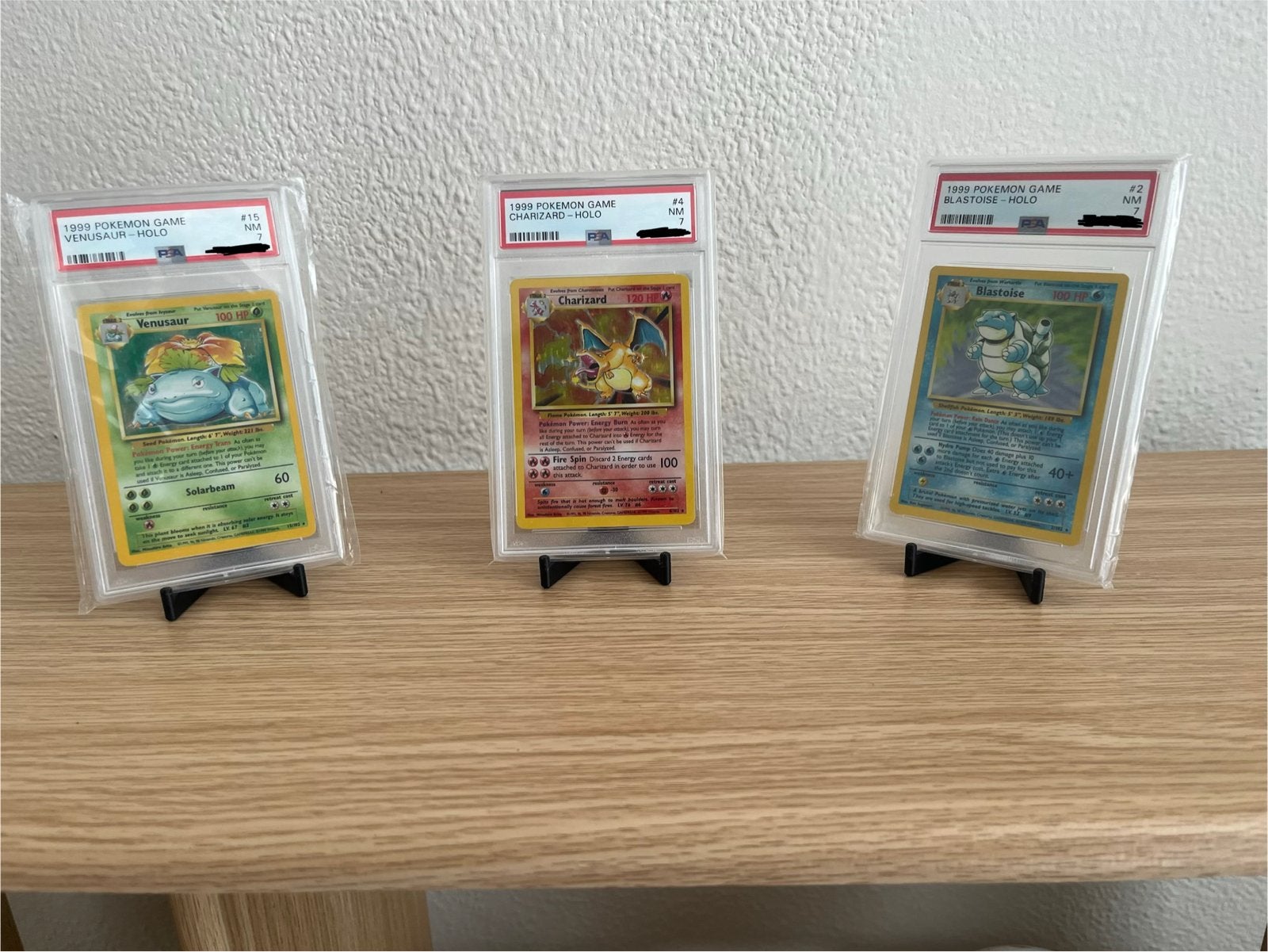 PSA 7 Base Set Trio: Blastoise, Venusaur & Charizard, Hobby en Vrije tijd, Verzamelkaartspellen | Pokémon, Ophalen, Gebruikt, Foil