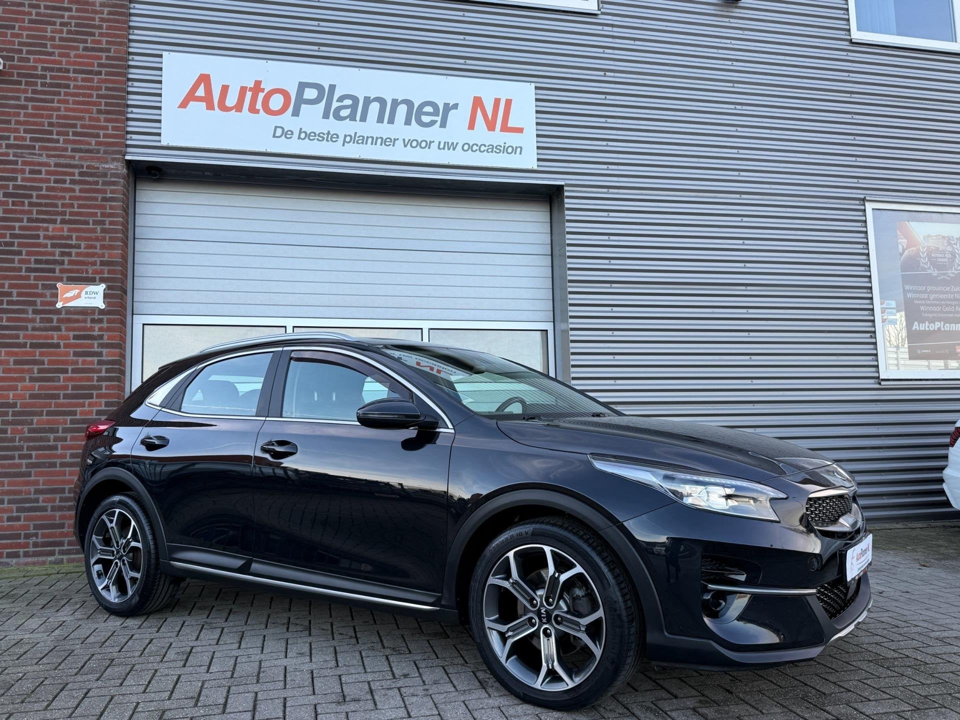Kia XCeed 1.4 TGDI Spirit! Camera! Clima! Cruise! Navi!, Auto's, Kia, XCeed, Zwart, 4 cilinders, Leder en Stof