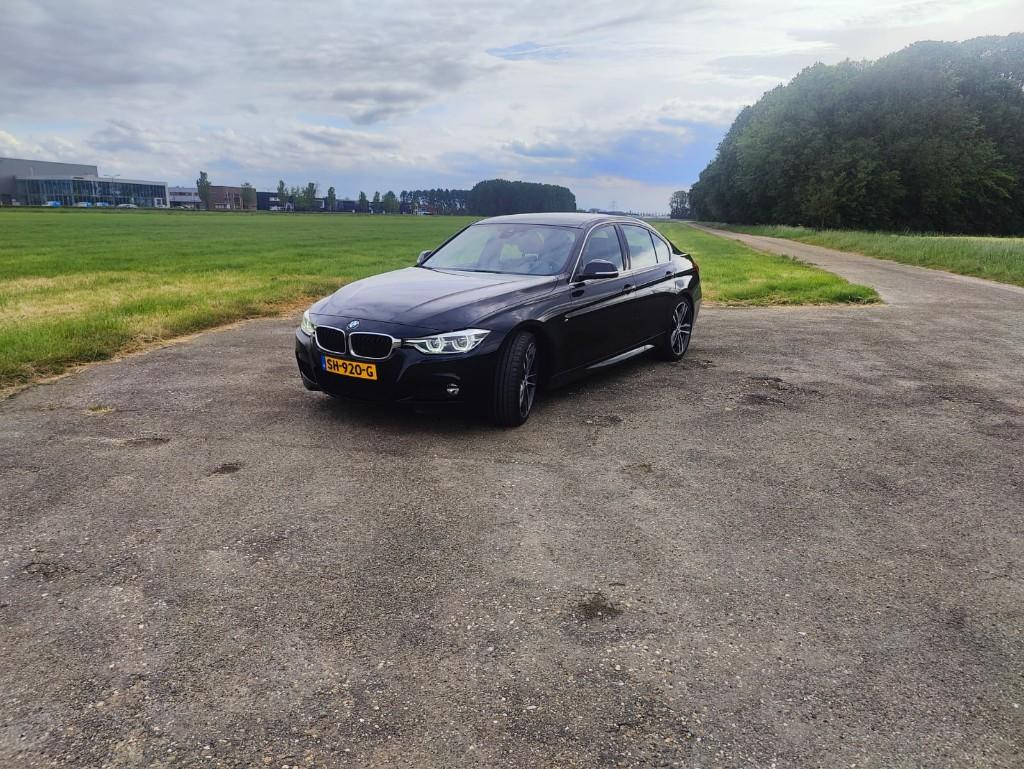 BMW 3-Serie 320i 184pk Aut 2018 Zwart, Auto's, Automaat, 1998 cc, Achterwielaandrijving, 1800 kg