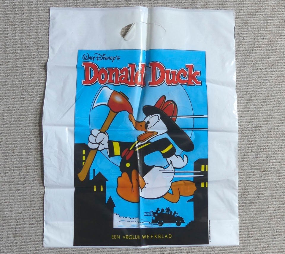 Donald Duck als brandweerman plastic tas, Ophalen of Verzenden, Donald Duck, Gebruikt, Tas, Koffer of Zak