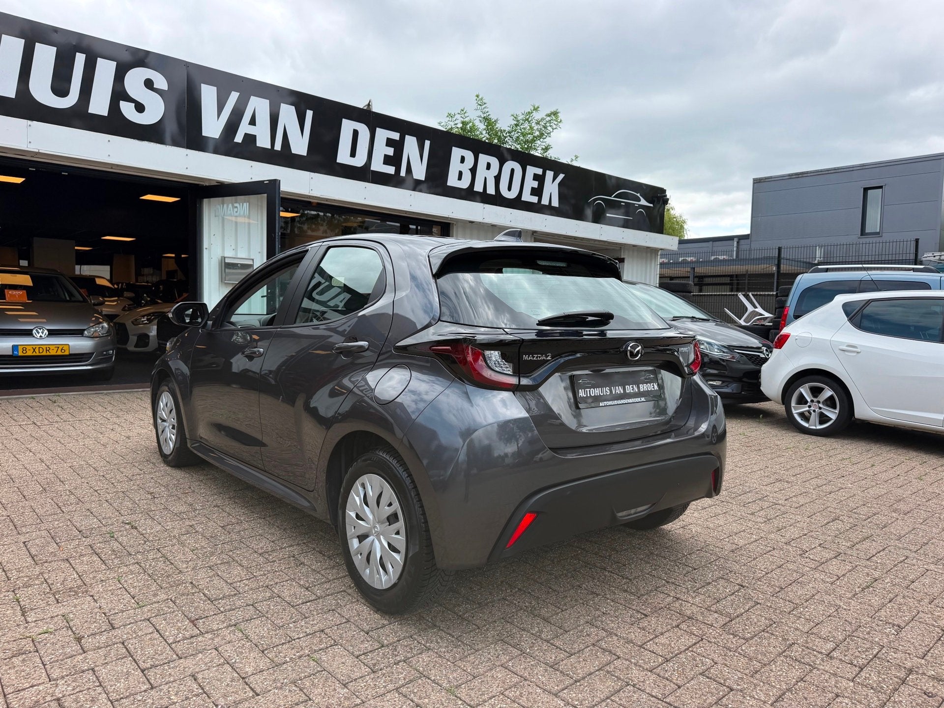 Mazda 2 Hybrid 1.5 Hybrid|Navi|Led|Adaptive Cruise|Carplay|C, Auto's, Mazda, Stof, Gebruikt, Zwart, Bedrijf