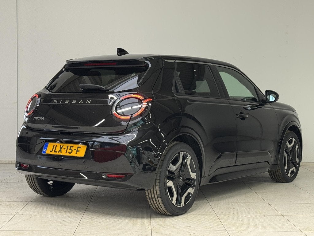 Nissan Micra EVOLVE 52 kWh | DEMO | Navigatie | Stoel + Stuu, Auto's, Nissan, Stof, Huisgarantie, Zwart, Origineel Nederlands