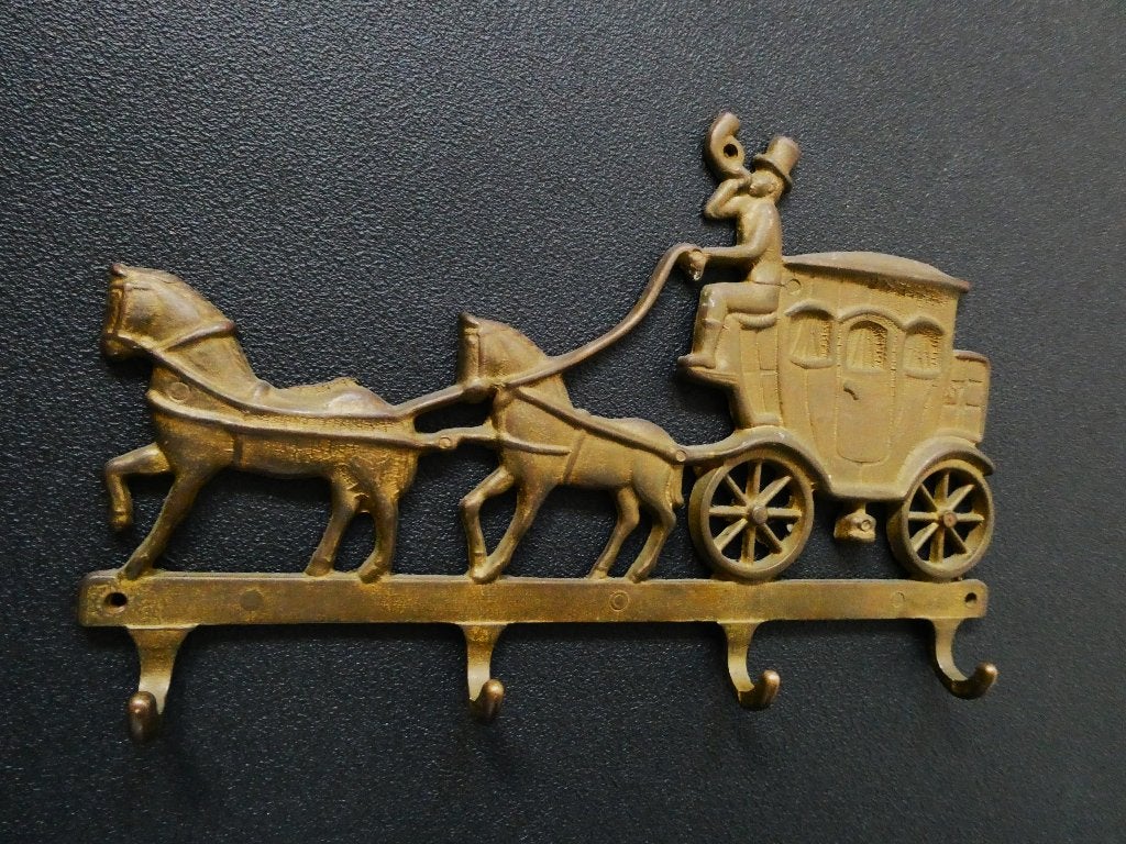 Een messing sleutelrekje vorm  postkoets koetsier paard, Ophalen of Verzenden