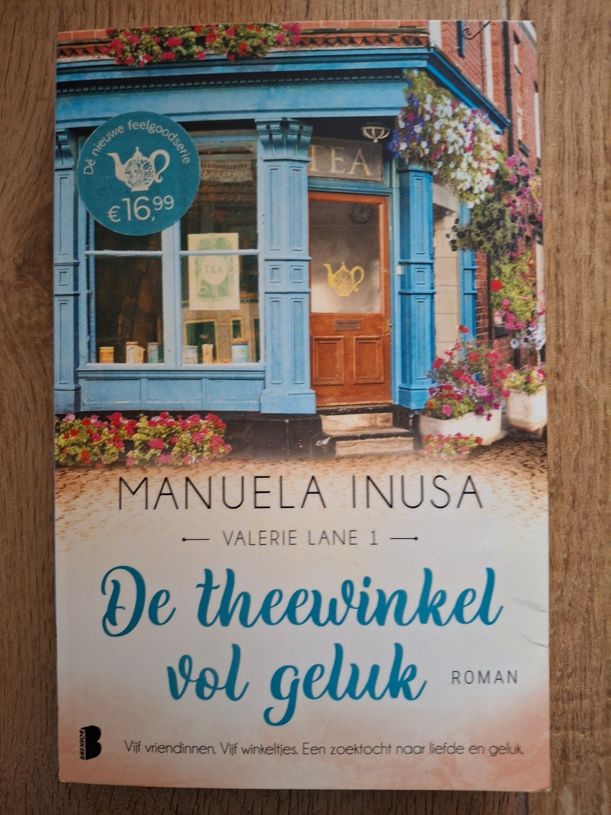 Manuela Inusa - De theewinkel vol geluk, Ophalen of Verzenden, Zo goed als nieuw, Manuela Inusa