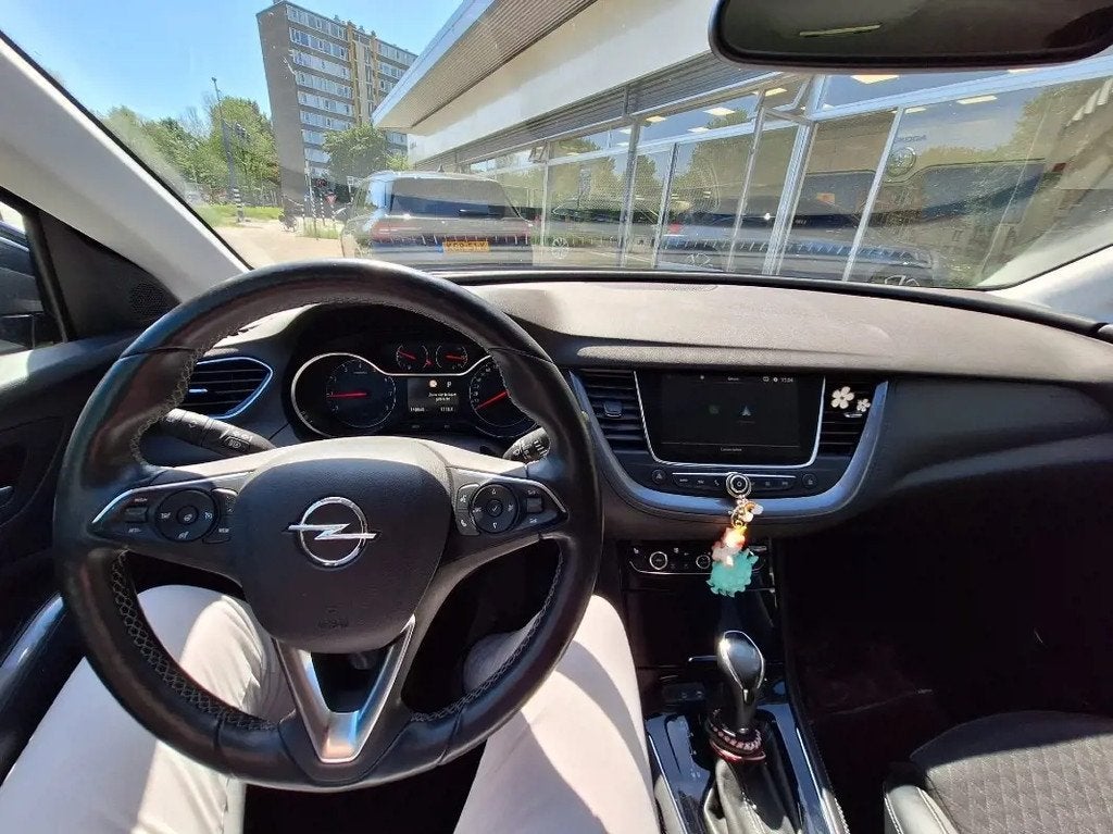 Opel Grandland X 1.2 Turbo Innovation Automaat LED Navi Trek, Auto's, Opel, Gebruikt, 1199 cc, Leder en Stof, Zwart