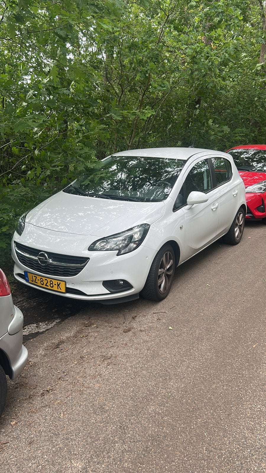 Opel Corsa 1.0T 66KW/90PK 5D 2016 Wit, Auto's, Opel, Voorwielaandrijving, Stof, Zwart, Parkeercamera