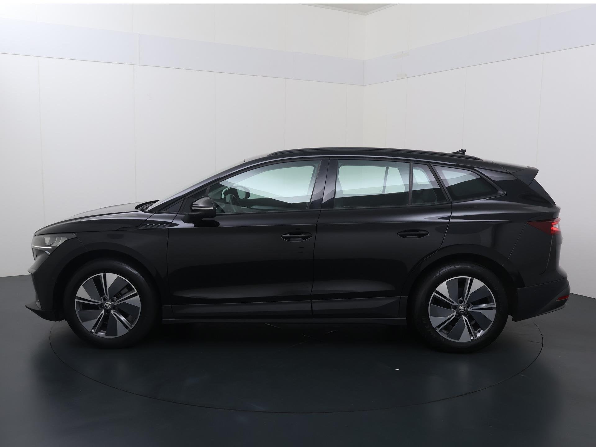 Skoda Enyaq iV 60 | 180 PK | SoH % | Cruise Control | Climat, Achterwielaandrijving, Gebruikt, Leder en Stof, Zwart
