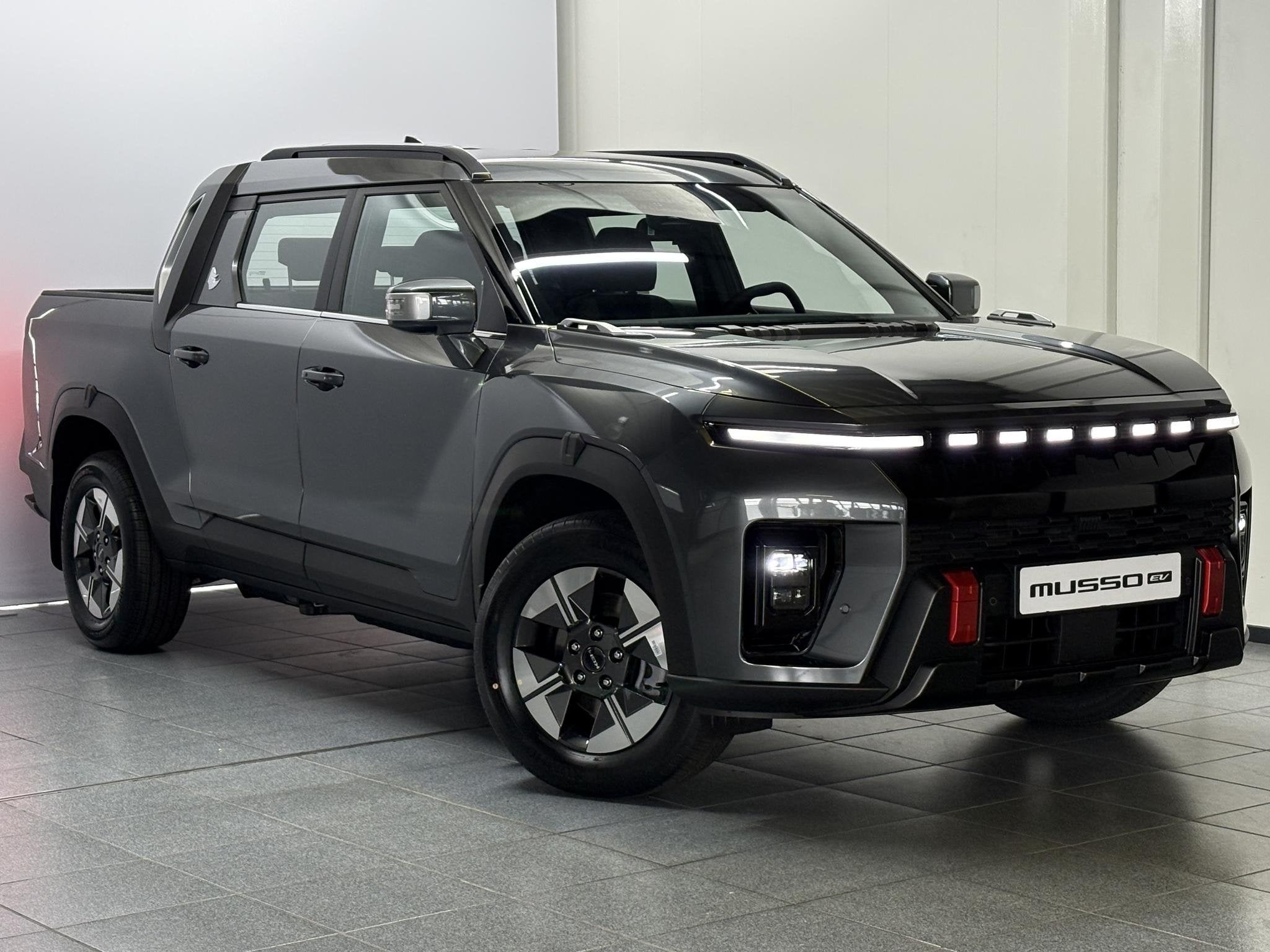KGM Musso EV Bronze 80.6 kWh 4WD Automaat, Keyless Entry/Sta, Auto's, 12 maanden, Stof, 379 km, Automatische klimaatregeling