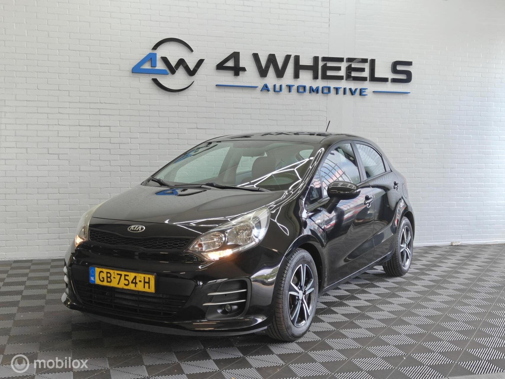 Kia Rio 1.2 CVVT ComfortLine, 1027 kg, 450 kg, 4 cilinders, Zwart