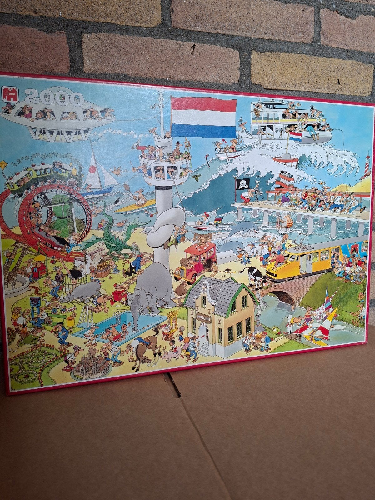 Jan van Haasteren puzzel - By air, land and sea, Hobby en Vrije tijd, Denksport en Puzzels, Ophalen, Meer dan 1500 stukjes, Zo goed als nieuw