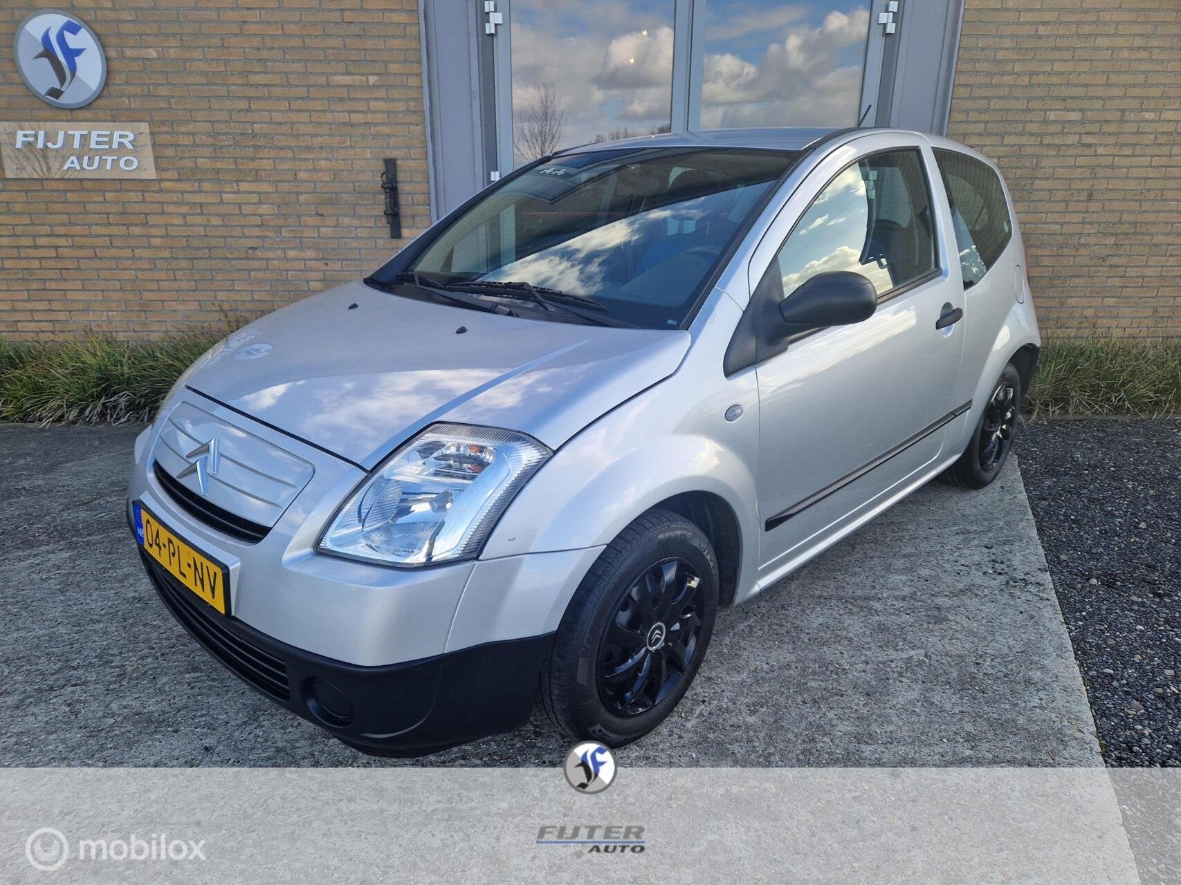Citroen C2 1.1i Ligne Ambiance, Auto's, Citroën, Voorwielaandrijving, 450 kg, 4 cilinders, Met garantie (alle)