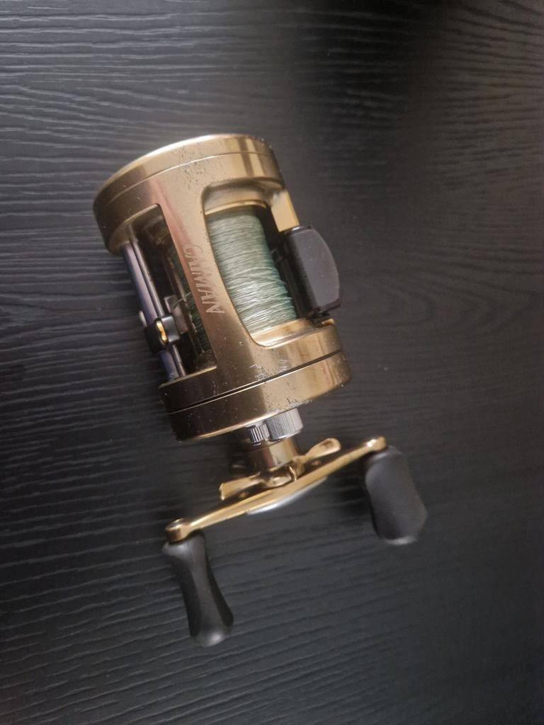 Tica caiman reel zo goed als nieuw., Ophalen of Verzenden