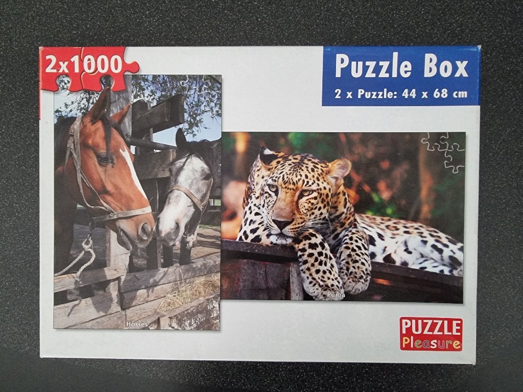 Legpuzzel 2 x 1000 stukjes. Onderwerp paarden en poema, Ophalen of Verzenden, 500 t/m 1500 stukjes, Zo goed als nieuw, Legpuzzel