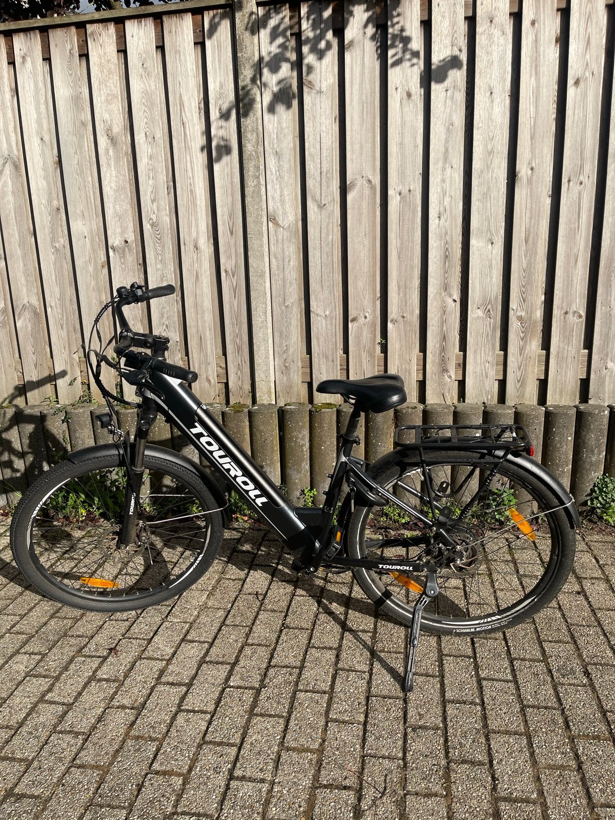 Touroll elektrische fiets - remmen moeten vervangen, Fietsen en Brommers, Ophalen, Gebruikt, 30 tot 50 km per accu, Overige merken